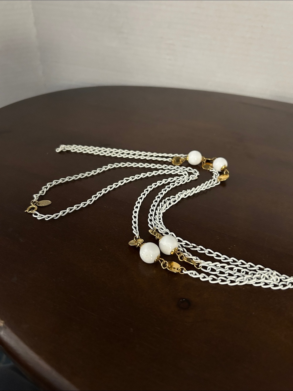Vtg Vendome white metal chain with white lucite beads surrounded by gold tone